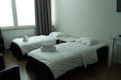 Apartamento Hotelli Alexanderin Huoneistohotelli Huoneet