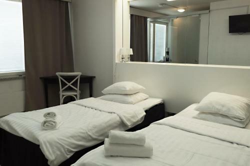 Apartamento Hotelli Alexanderin Huoneistohotelli Huoneet