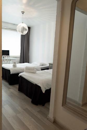Apartamento Hotelli Alexanderin Huoneistohotelli Huoneet