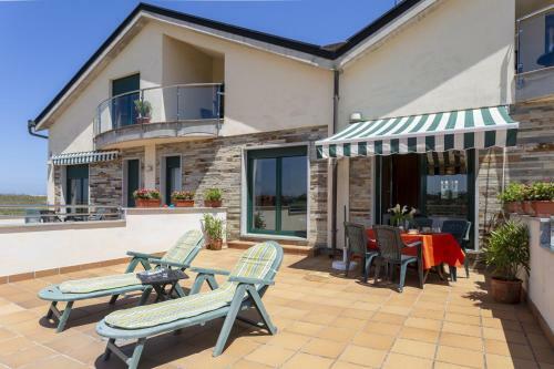Apartamentos Tur�sticos Playa de Tapia