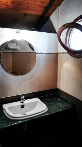 Frenteabastos Hostel & Suites