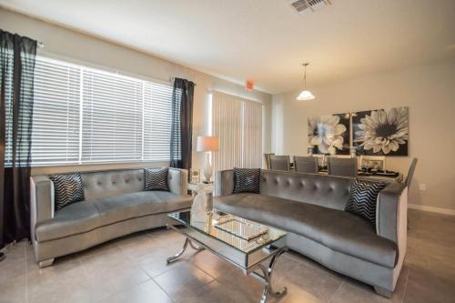 Glamorous 4 Bedroom 3.5 Bath End Unit Town Home Located In Compass Bay