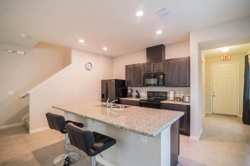 Glamorous 4 Bedroom 3.5 Bath End Unit Town Home Located In Compass Bay