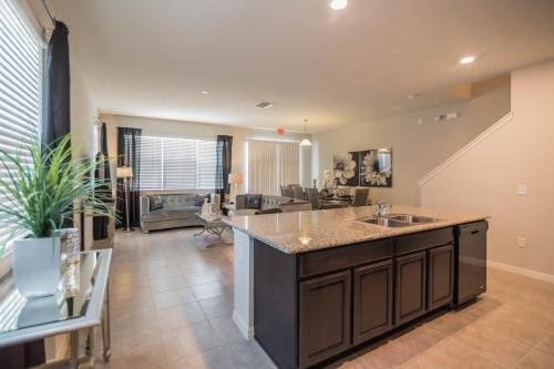 Glamorous 4 Bedroom 3.5 Bath End Unit Town Home Located In Compass Bay