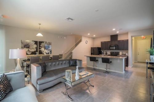 Glamorous 4 Bedroom 3.5 Bath End Unit Town Home Located In Compass Bay