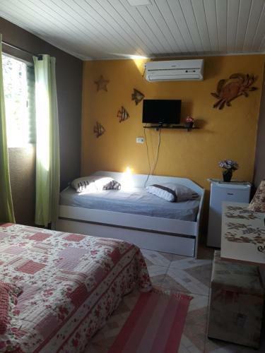 Hospedagem Guaruj�