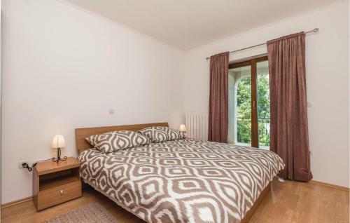 Three-bedroom Apartment In Lovran