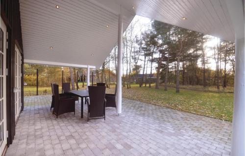 Three-bedroom Holiday Home In Vaggerlose