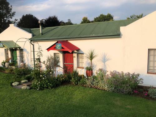 Hostal Peace Corner Cottages