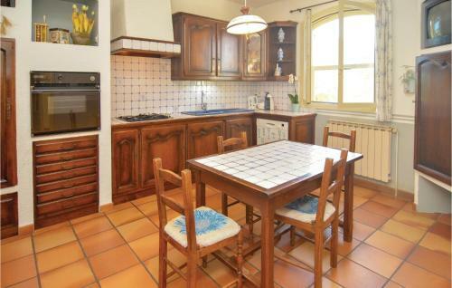 Three-bedroom Holiday Home In St-hilaire-d'ozlihan