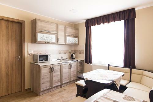 Cuha-gy�ngye Apartmanh�z