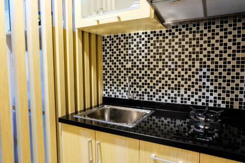Comfy Studio The Oasis Apartment Lippo Cikarang By Travelio