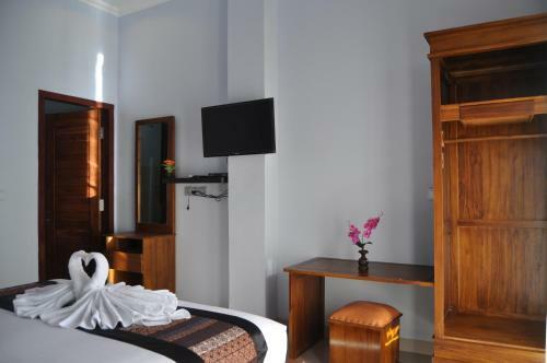 Hotel Pradana Beach Inn Luxury
