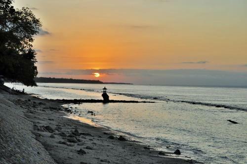 Hotel Pradana Beach Inn Luxury