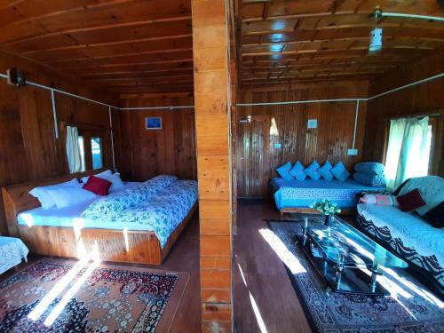 Ishan Log Huts Bahu