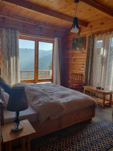 Ishan Log Huts Bahu