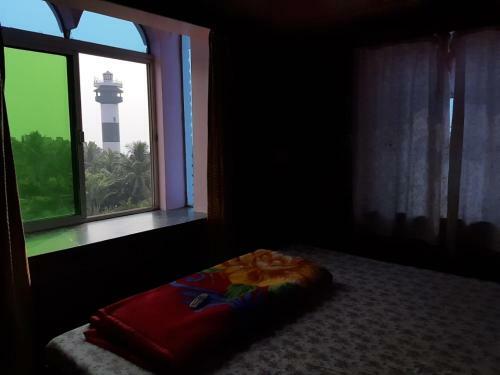 Hotel Goroomgo Sureswory Pampa Puri