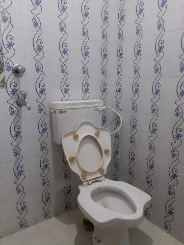 Hotel Goroomgo Sureswory Pampa Puri