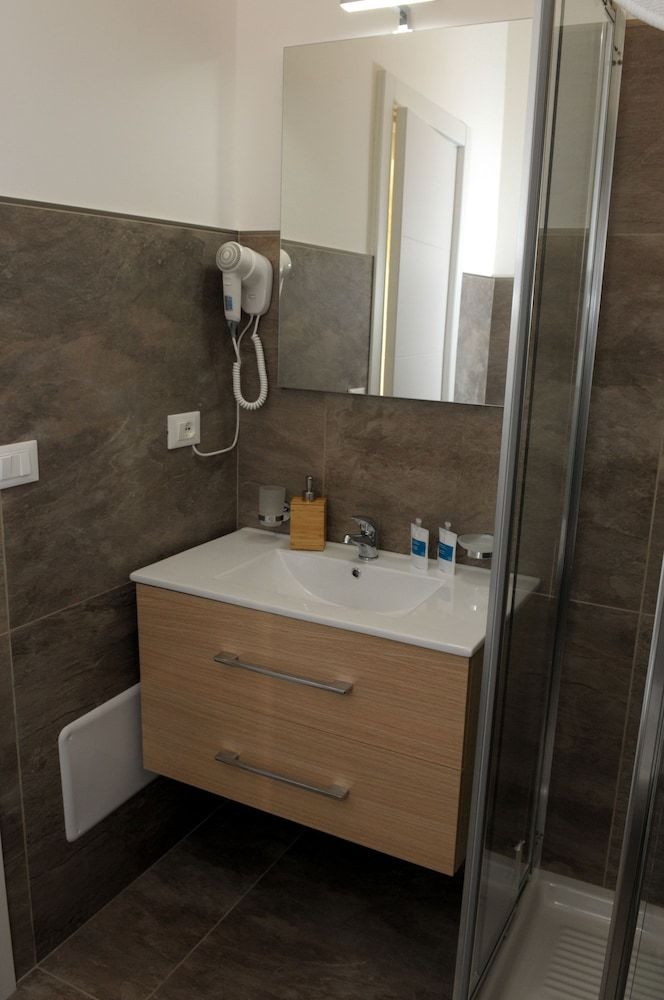 Hostal Della Torre Rooms