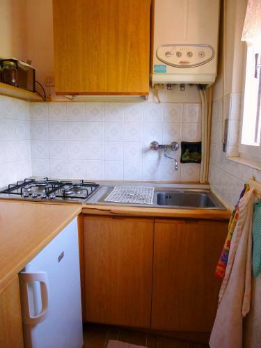 Apartamento Villaggio Arnalda