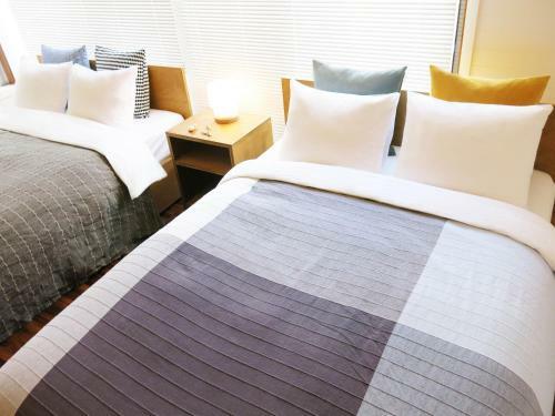 Apartamentos The Mona Hotel