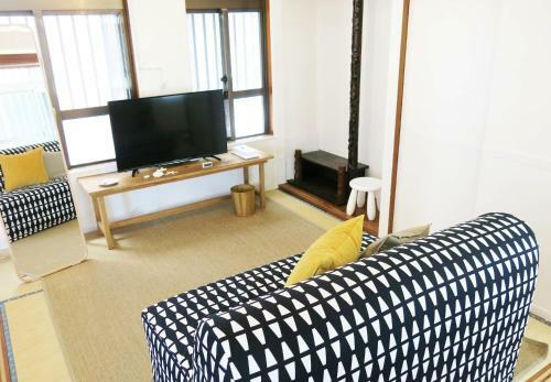 Apartamentos The Mona Hotel