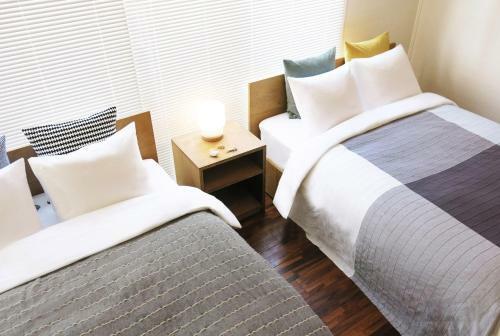 Apartamentos The Mona Hotel