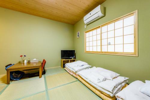 Hostal Wafu Ryokan Uehonmachi