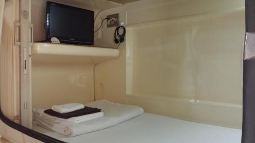 Capsule Hotel Honcho (male Only)