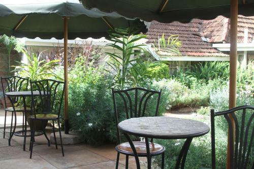 Hotel Amani Gardens Inn