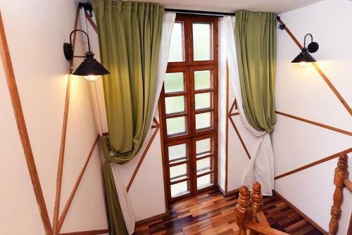 Hostal Holiday House Apartments