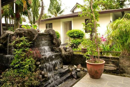 Hostal Qi Hotel And Club