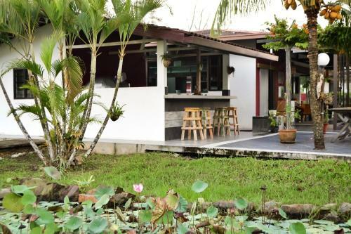 Hostal Qi Hotel And Club