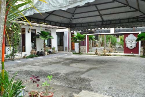 Hostal Qi Hotel And Club