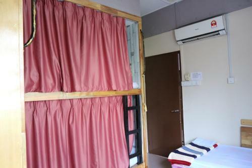 Albergue Escape Backpackers Kk