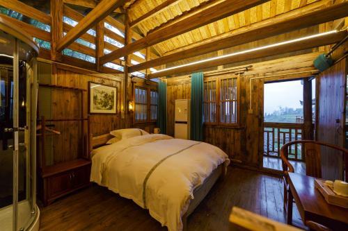 Hostal Zhang Jiajie Tujia Ethnic Guesthouse