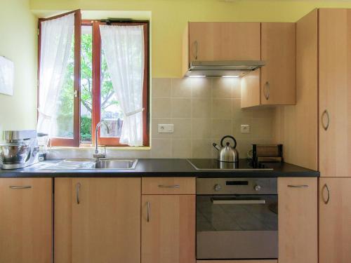 Cozy Cottage With Fenced Garden In Ayen