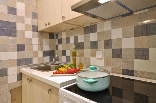 Apartamento Golden Fox Studios And Suites