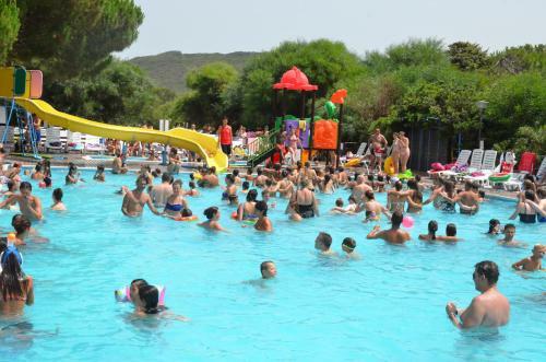 Happy Camp Mobile Homes In Camping Village Bella Sardinia