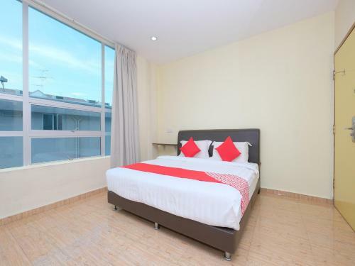 Hostal Oyo 89493 Q Hotel