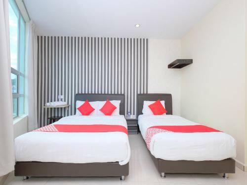 Hostal Oyo 89493 Q Hotel