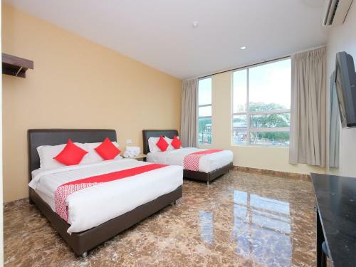 Hostal Oyo 89493 Q Hotel