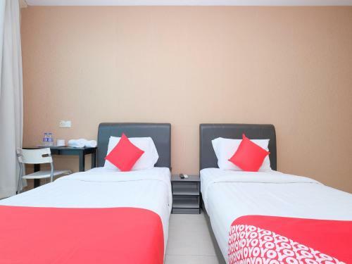 Hostal Oyo 89493 Q Hotel