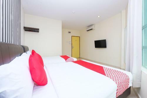 Hostal Oyo 89493 Q Hotel