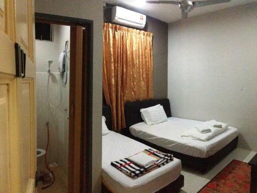 Hostal Anggun Beach Guest House