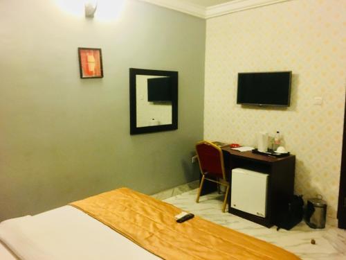 Hostal Esporta Suites Magodo