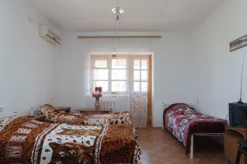 Hostal Gostevoi Dom Na Tonkom Mysy