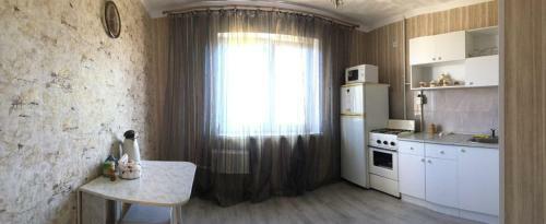 Apartment On Prospekt Komarova 31