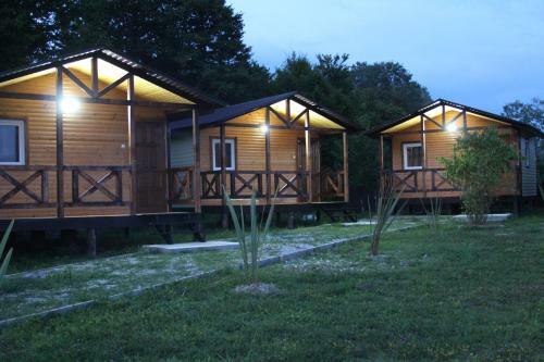 Camping "houses By The River"