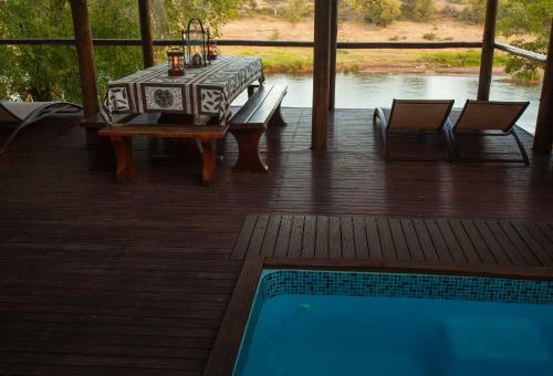 Lodge Ximongwe River Camp - Hippo Cottage